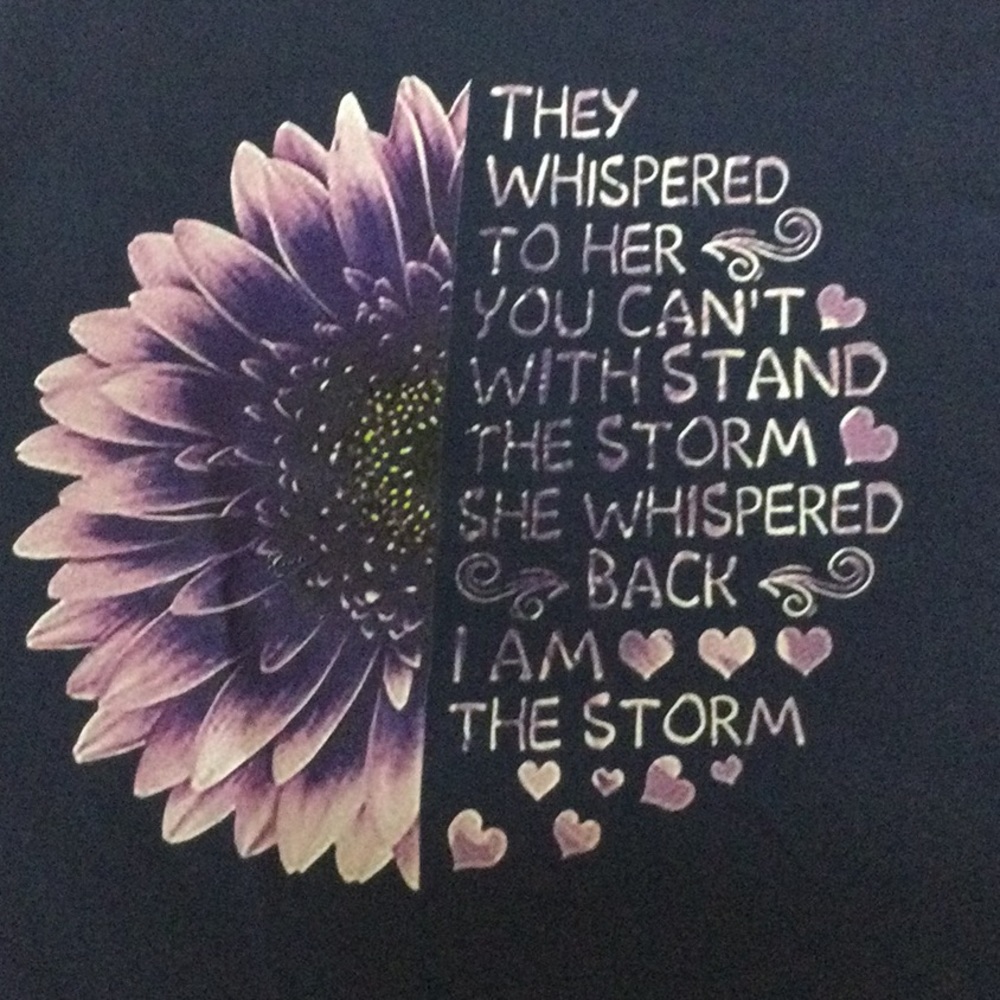 “I am the storm” women’s tee size large